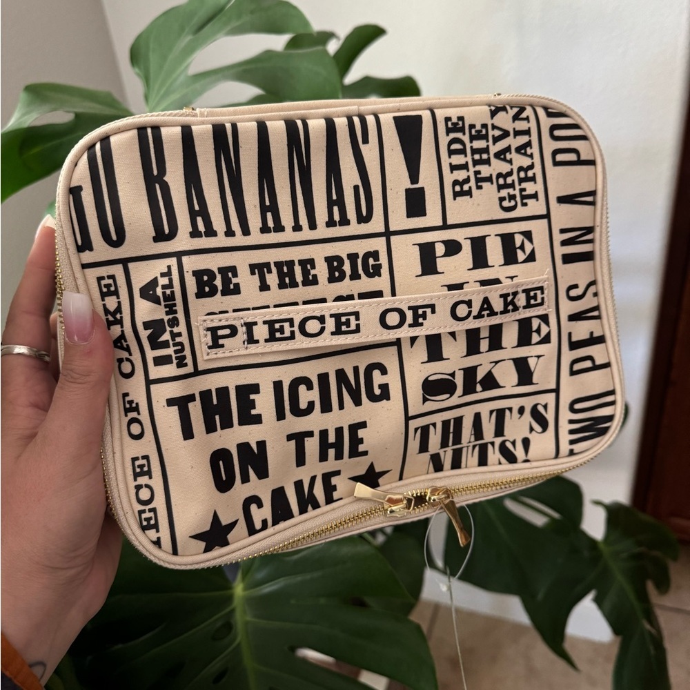 Kate Spade Lunch‎ Box Travel bag Black and Cream Graphic Clutch